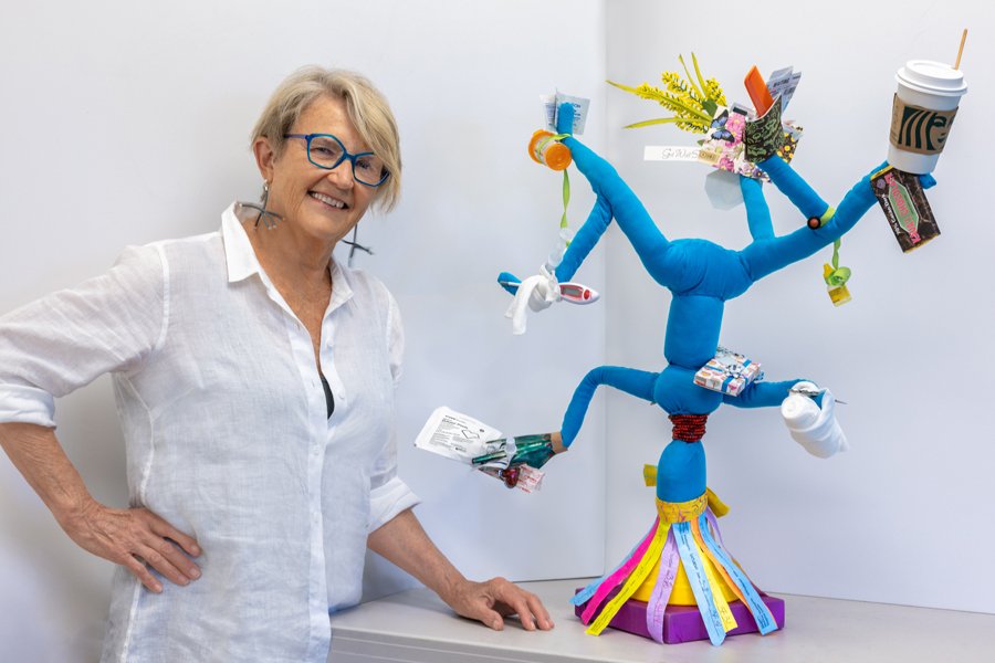 Pauline Siple with Caregiver soft sculpture, 2022